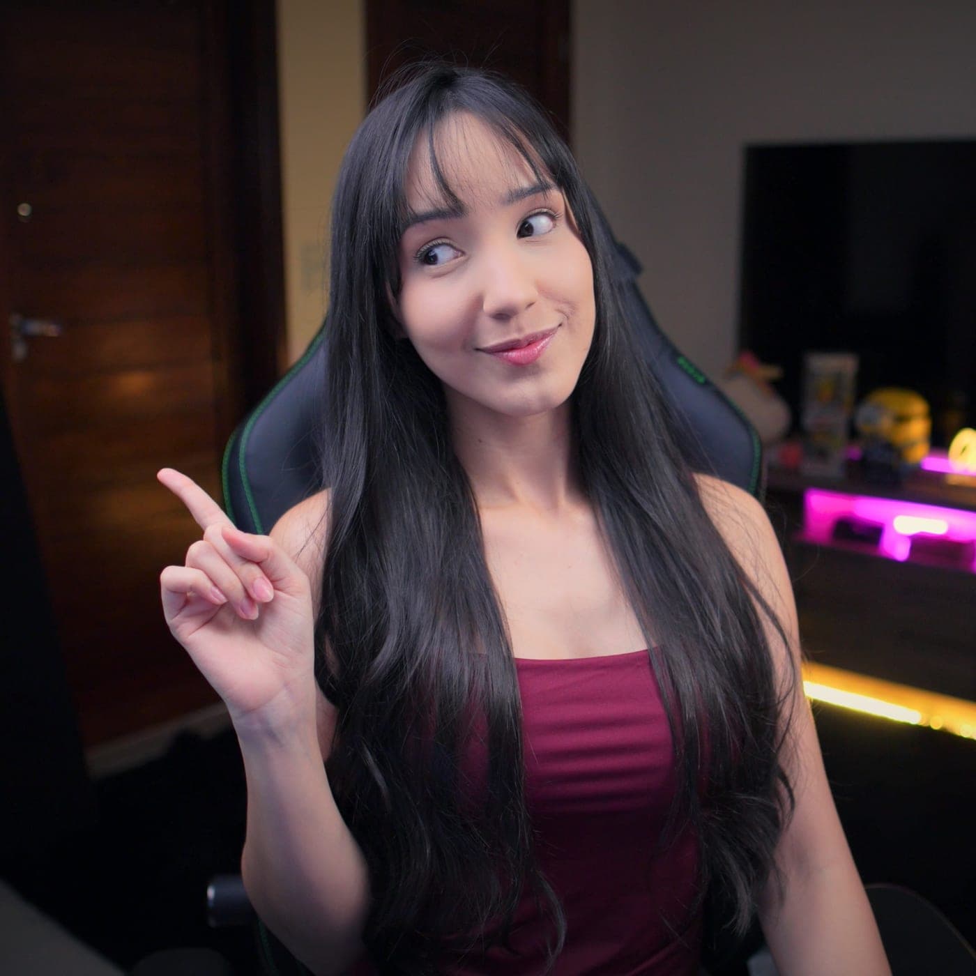 Mirys smiling, wearing a pink top
